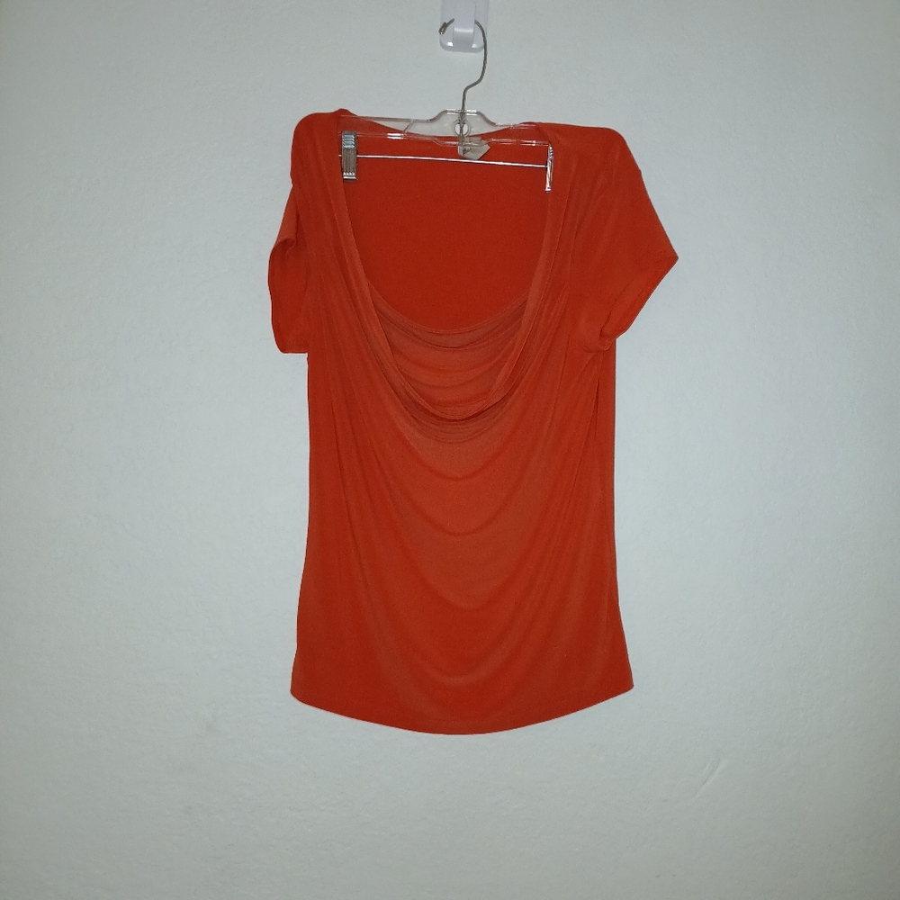 Susan lawrence, womens medium, orange top.